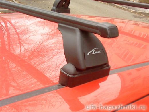 Багажник на крышу Opel Corsa D 2006-..., Lux, прямоугольные стальные дуги