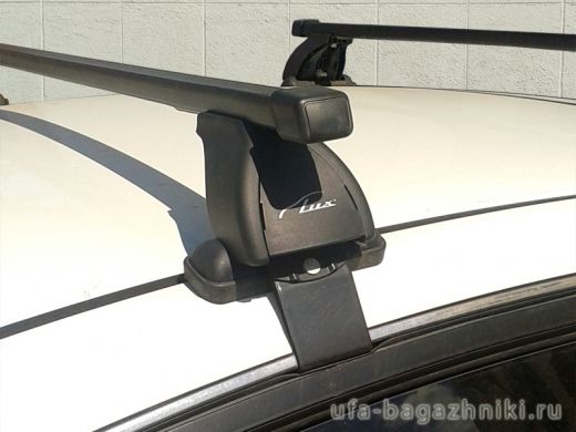 Багажник на крышу Nissan Almera 2012-..., Lux, прямоугольные стальные дуги