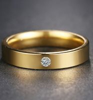 Позолоченное кольцо с цирконом