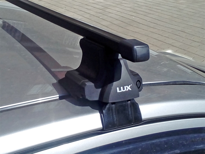 Универсальный багажник на крышу Nissan Note, D-Lux 1, стальные прямоугольные дуги
