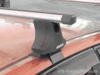 Багажник на крышу Ford Focus 3, Атлант, аэродинамические дуги "Эконом"