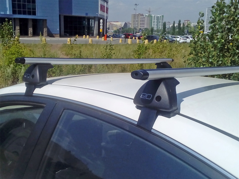 Багажник на крышу Nissan Almera 2012-..., Евродеталь, аэродинамические дуги