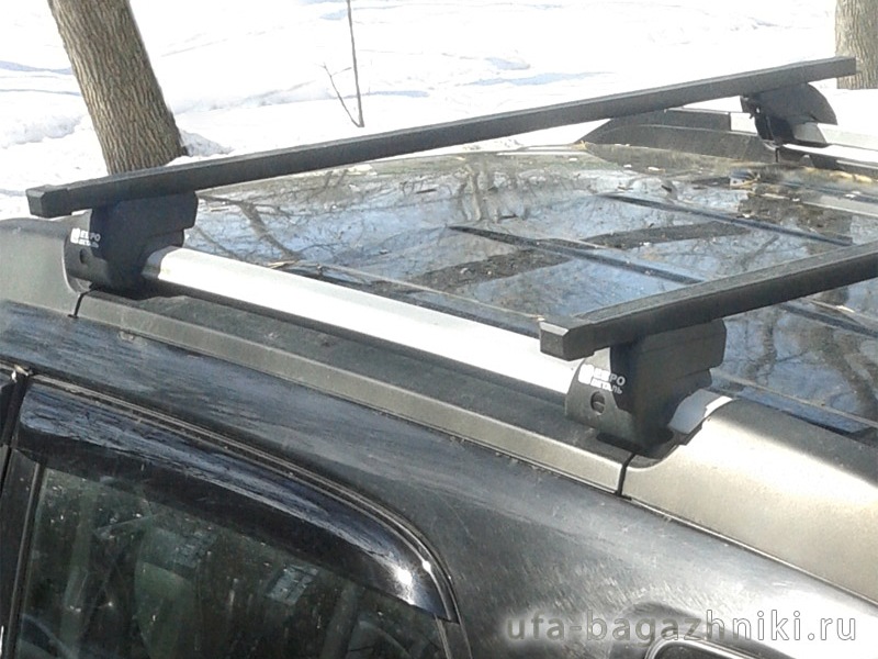 Багажник на крышу - стальные прямоугольные дуги на рейлинги Kia Sportage 2004-2010, Евродеталь