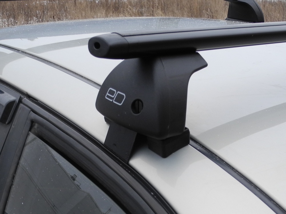 Багажник на крышу Toyota Hilux, Евродеталь, аэродинамические дуги (черный цвет)