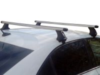 Багажник на крышу Skoda Octavia A8, Атлант, аэродинамические дуги Эконом, опора Е
