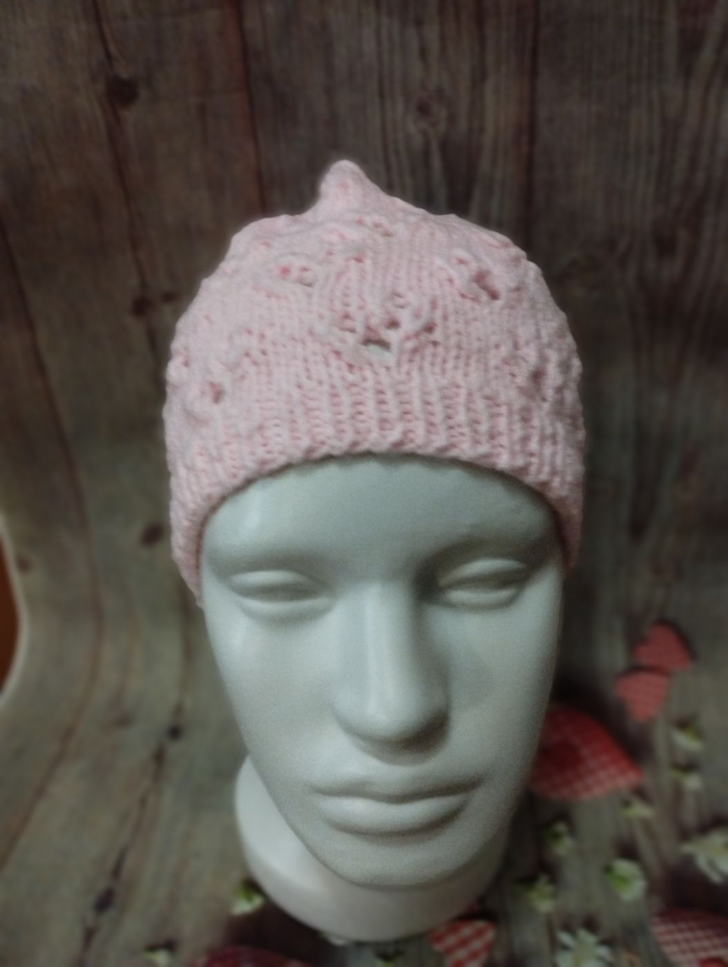 Розовая ажурная шапочка