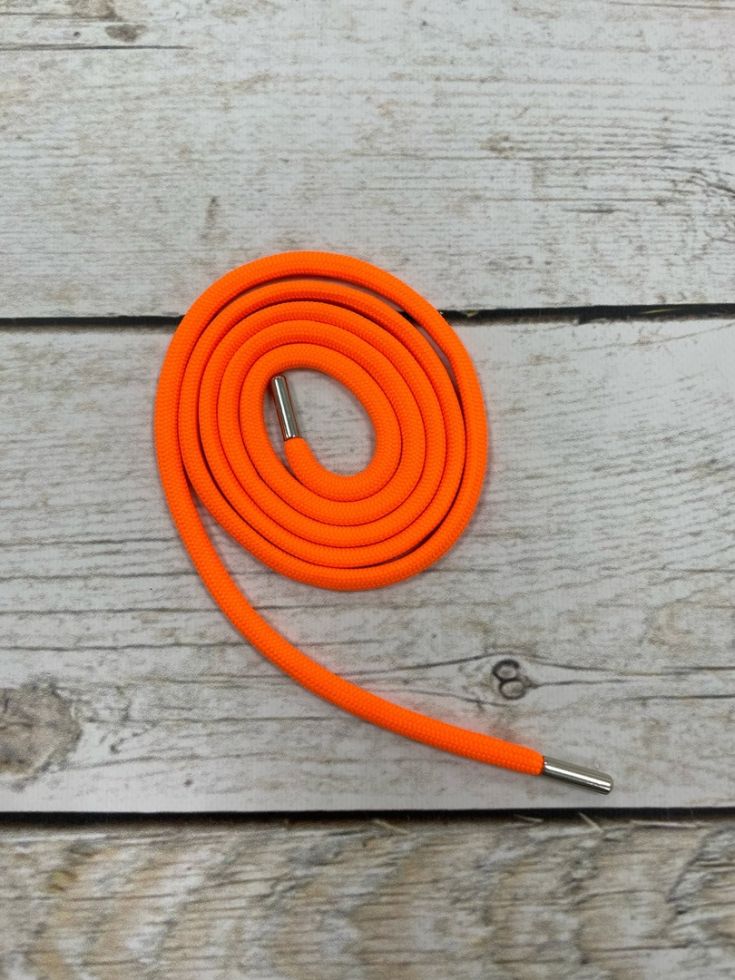 Круглый хлопковый плетенный шнур  оранж неон с металлическими наконечниками